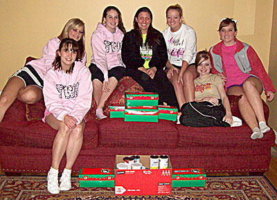 TWC Cheerleaders prepare Operation Christmas Child Boxes